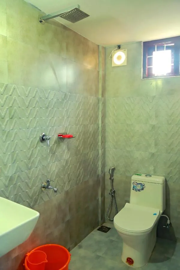 Casa de hóspedes Royal Triples Hotel Kottayam